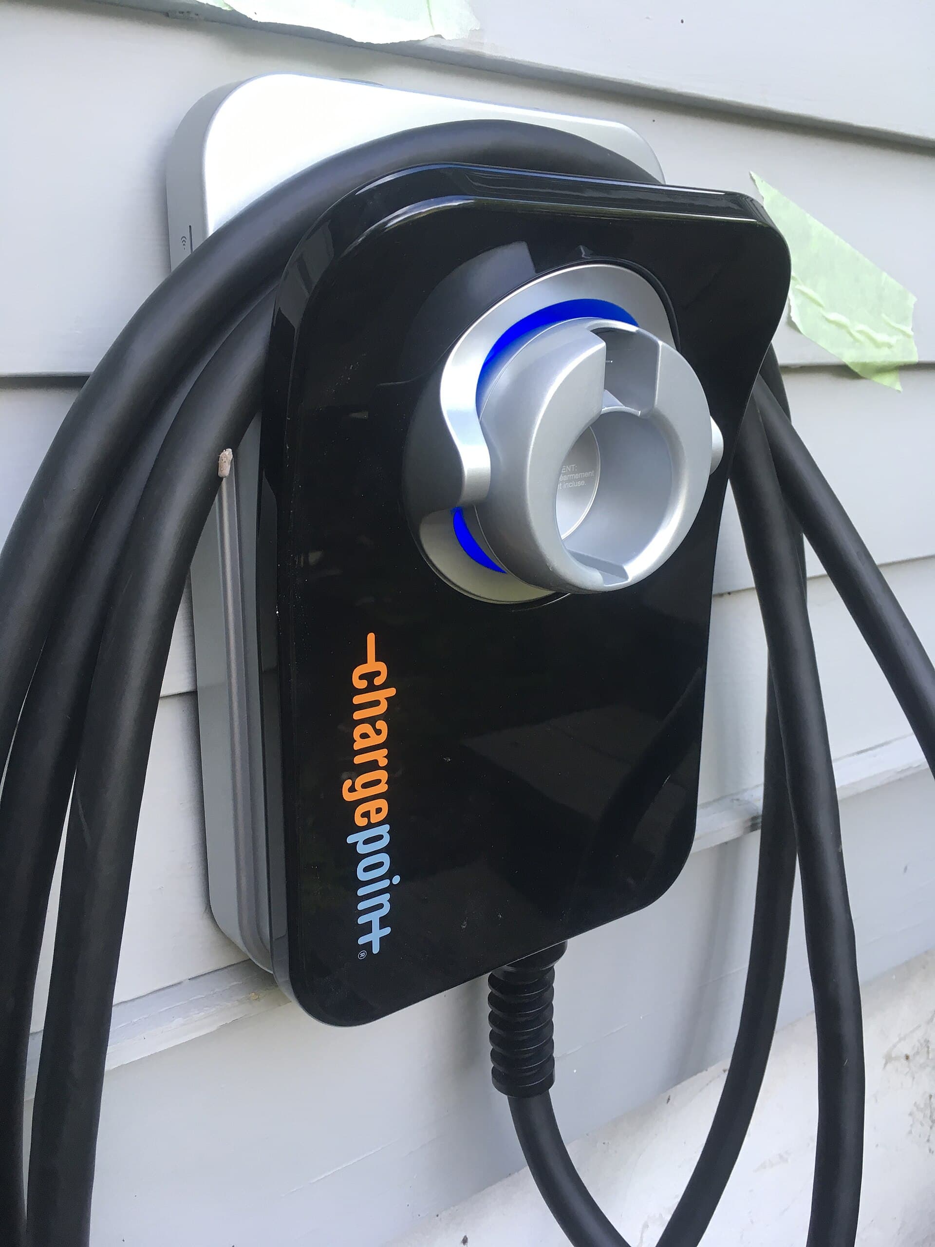 Home EV wall charger mounted for residential overnight charging