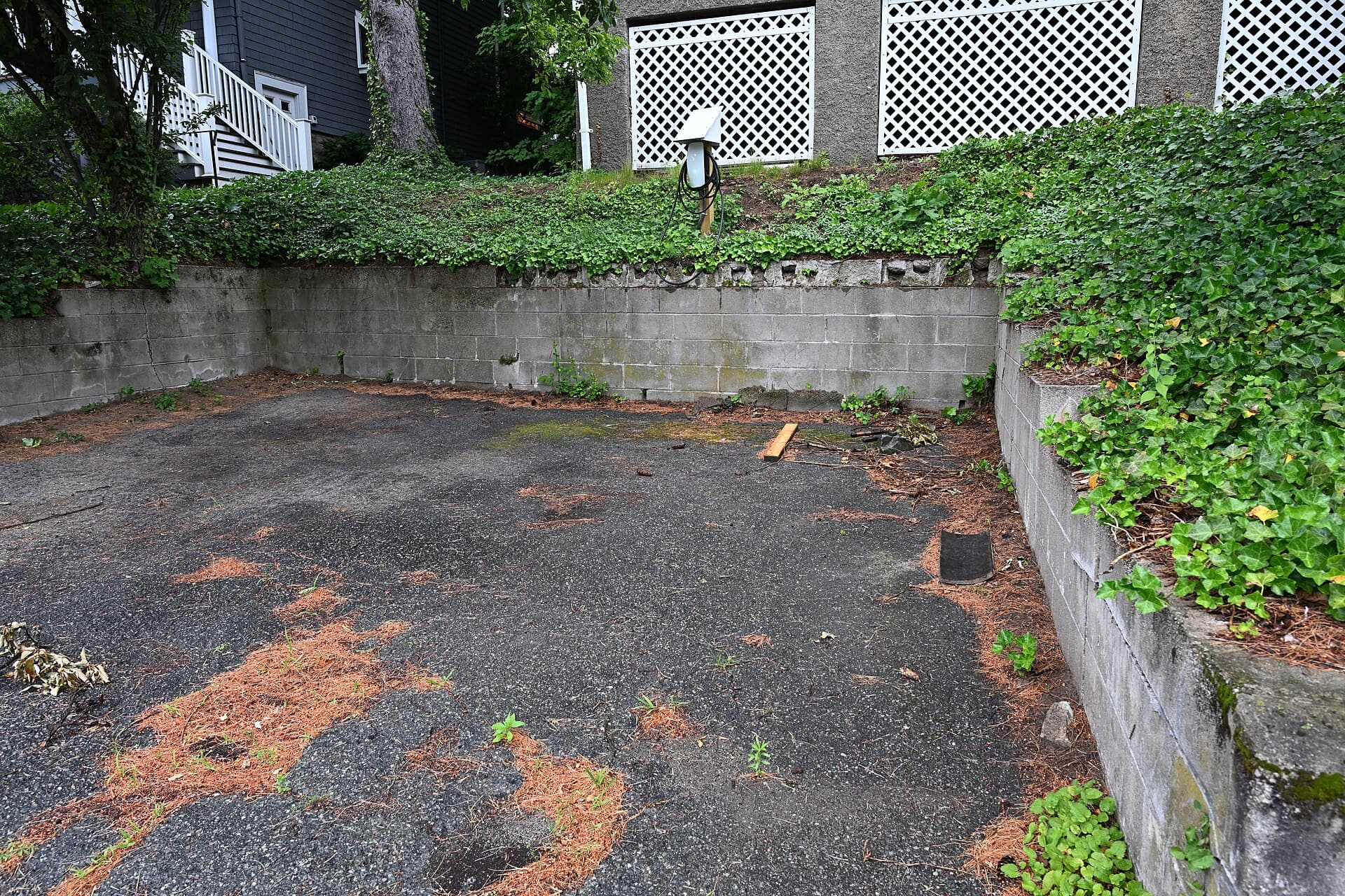 Tesla Wall Connector installed outdoors for home EV charging